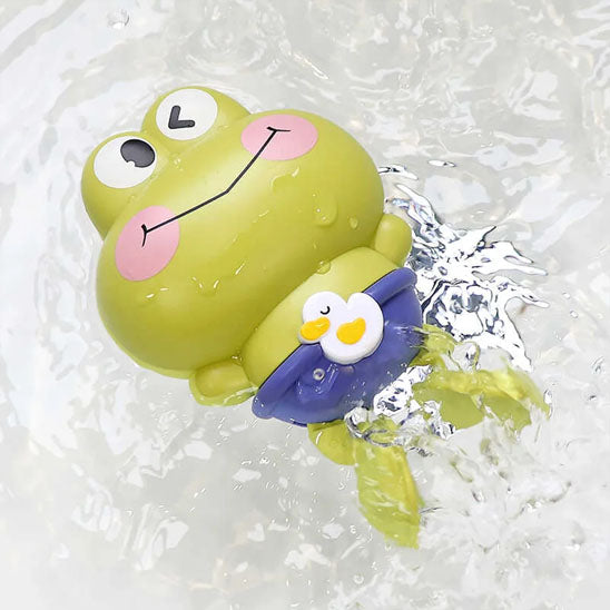 Jouet de bain bébé grenouille nageuse flottant dans l’eau