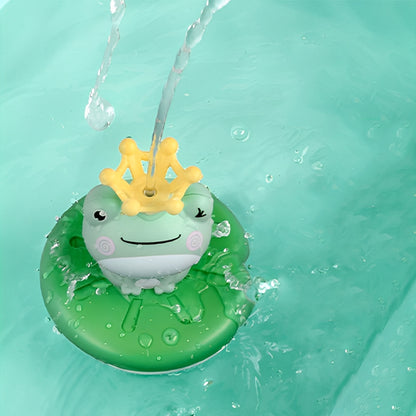Le jouet de bain MagikGrenouille™ projette de l’eau dans la piscine.