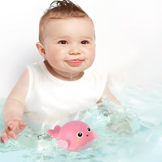 Bébé content dans la piscine avec son jouet de bain | BabyDolphin