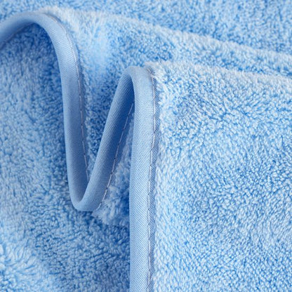 La matière épaisse de la cape de bain pour bébé